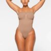 SEAMLESS SCULPT STRAPLESS THONG BODYSUIT