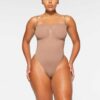 SEAMLESS SCULPT STRAPLESS THONG BODYSUIT