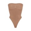 SEAMLESS SCULPT STRAPLESS THONG BODYSUIT
