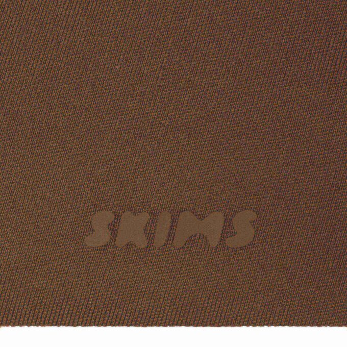 SKIMS ULTIMATE BODY PUSH-UP THONG BODYSUIT SKIMS ULTIMATE BODY PUSH-UP THONG BODYSUIT